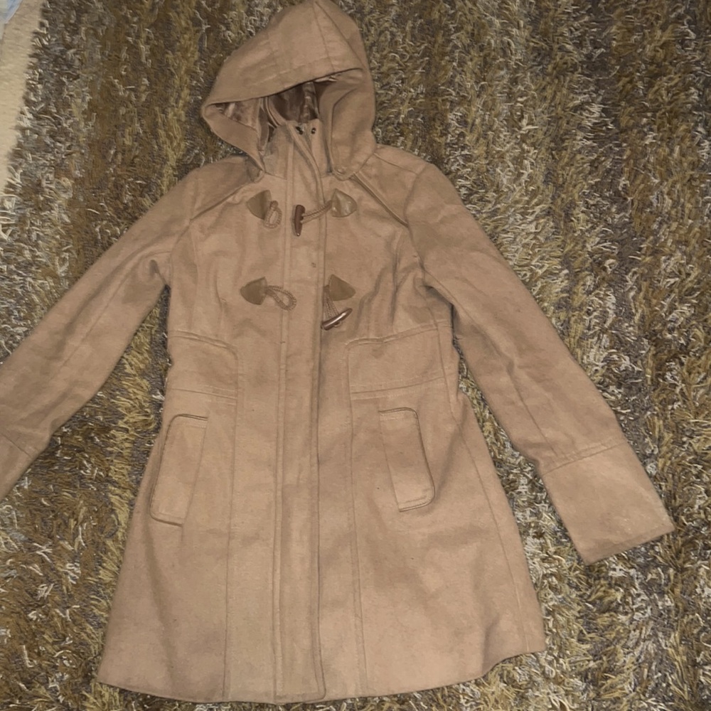 Coat with tassels